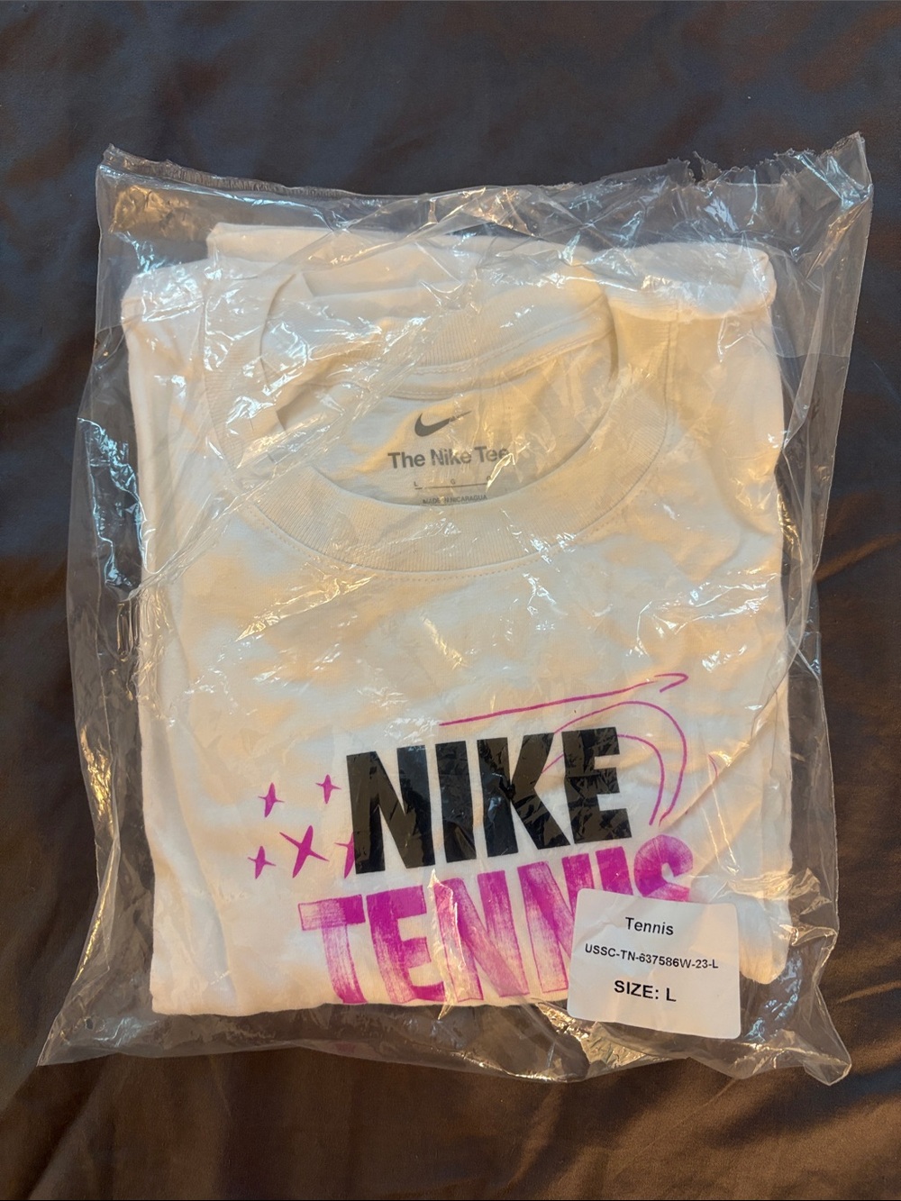 Nike Tennis Camp White Short-Sleeve Tee with Black and Pink Graphic